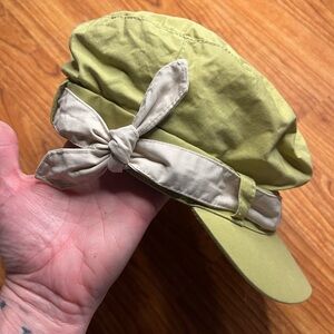 Lime green newsboy hat with cream bow